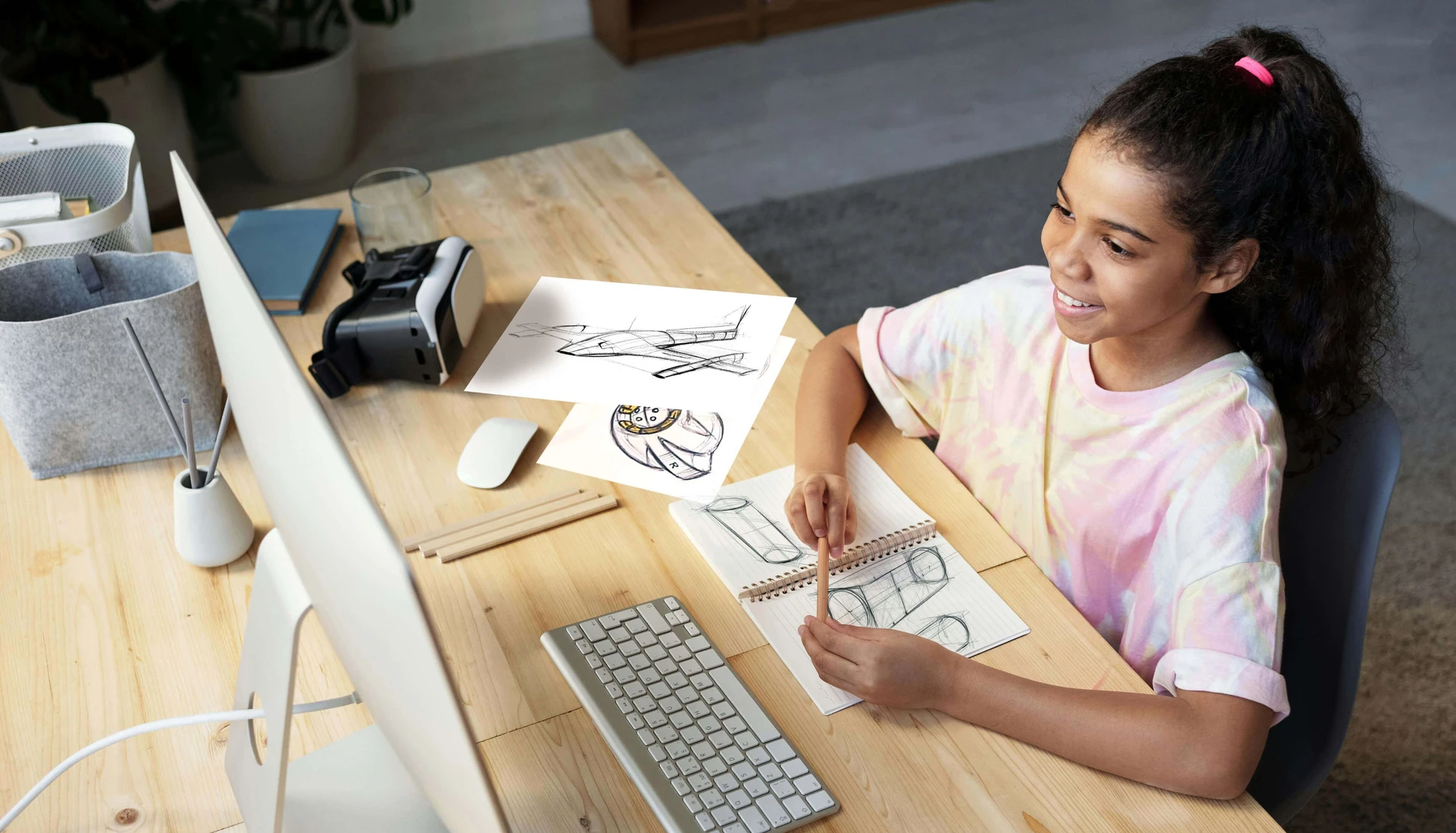 Child sketching with a tutor
